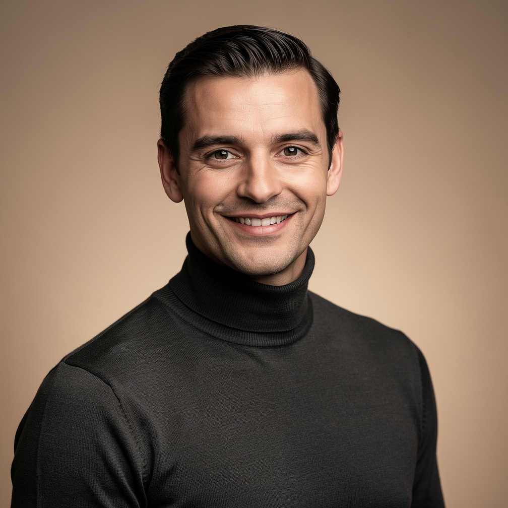 Studio portrait of a Belgian man with a warm smile